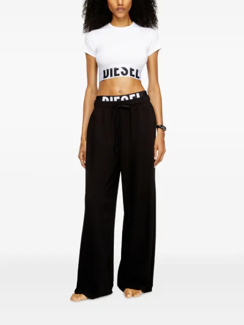Leslie-D-Pop logo-print trousers 2